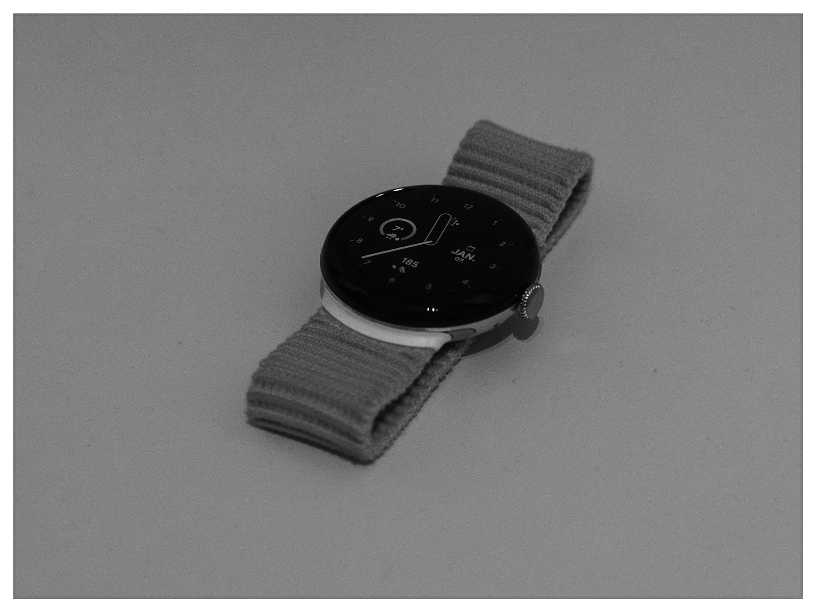 A black and white photo of a smart watch