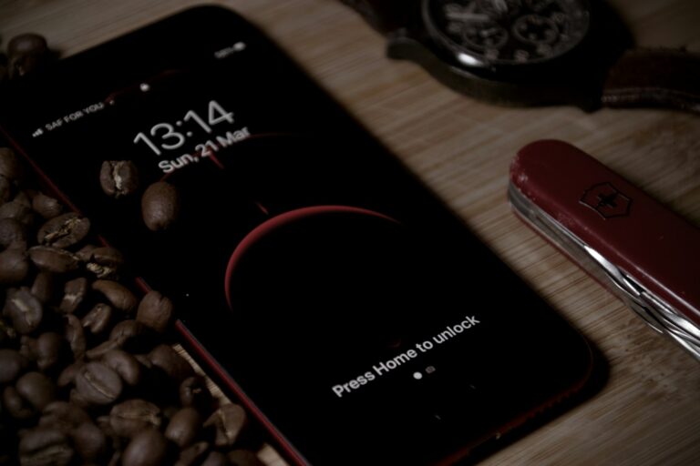 black samsung android smartphone on brown wooden table