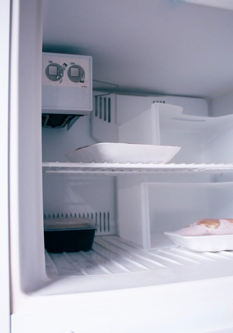 An open refrigerator with food inside of it