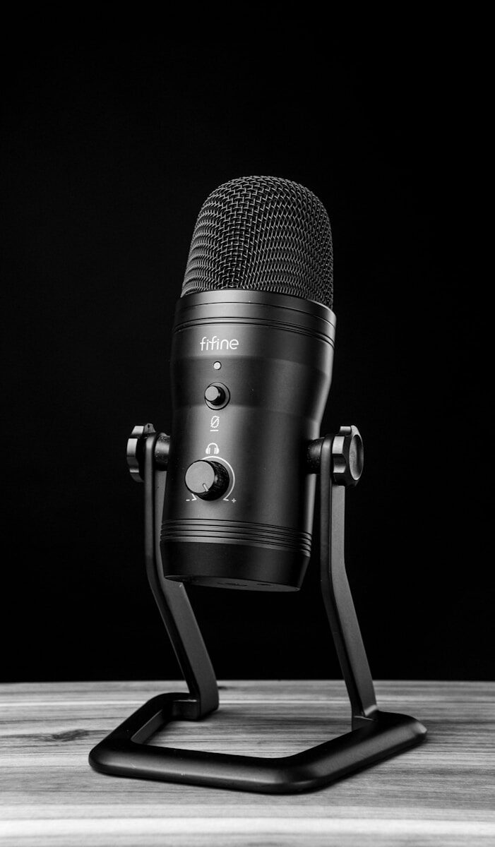 A microphone on a stand on a table