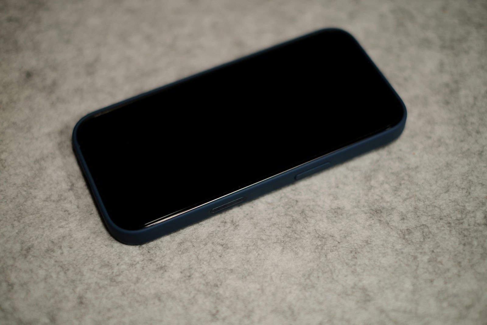 A close up of a cell phone on a table