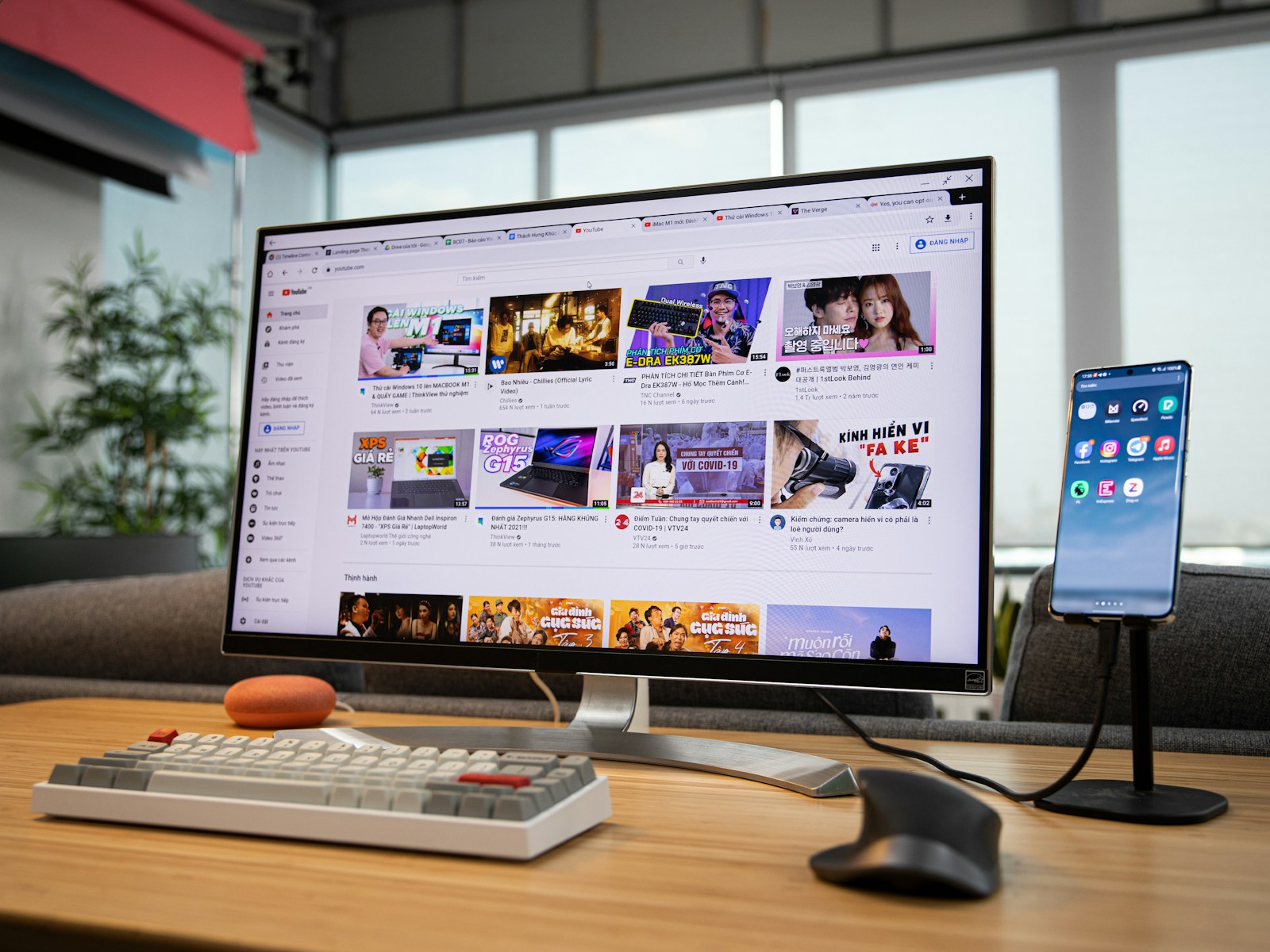 black flat screen computer monitor on brown wooden table